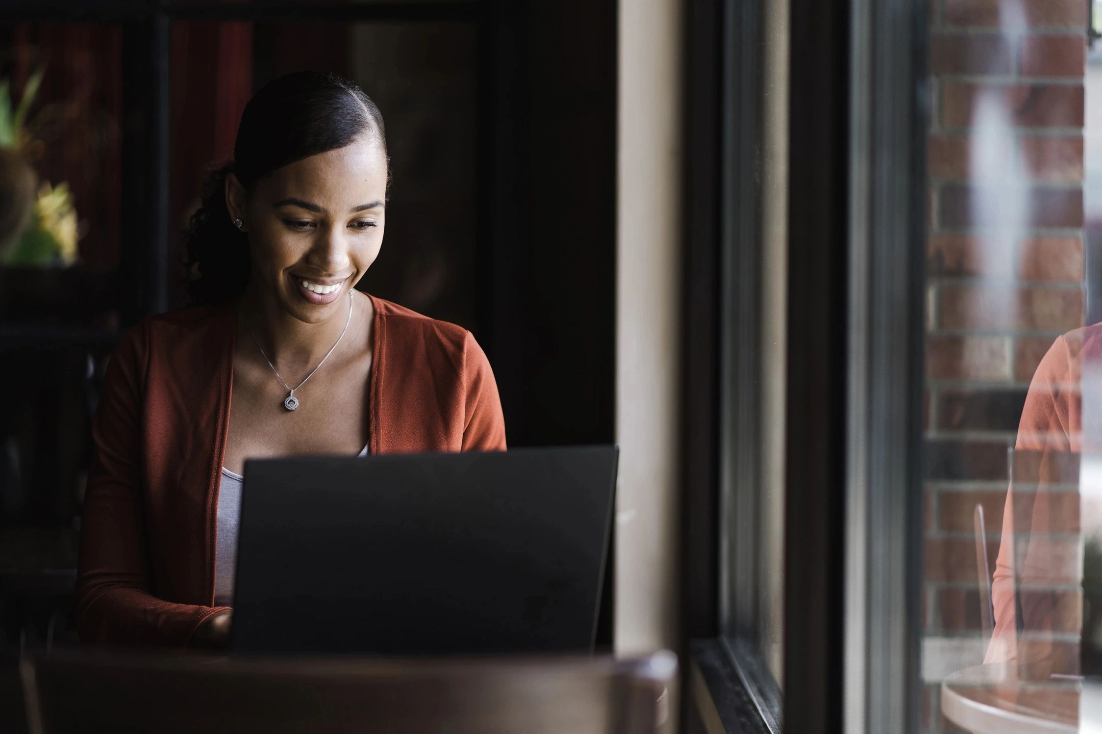 A woman using a laptop