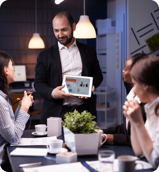 Businessman presenting data to colleagues.