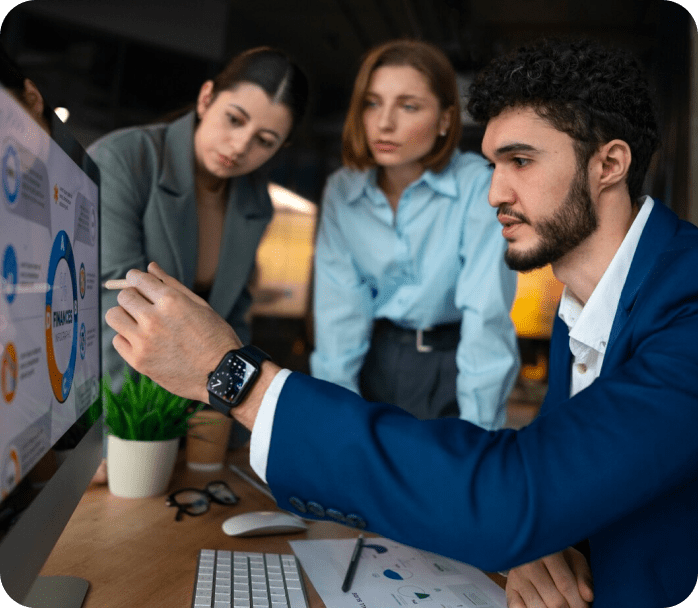 Man presenting data to colleagues.